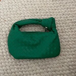 Similar looking to the Bottega Mini Jodie bag!